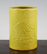 A Chinese yellow glazed brush pot, moulded Qianlong seal mark but later, of cylindrical form,