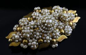 An Indian gold and seed pearl cluster brooch, of lozenge form, 2.5in. Starting Price: £160