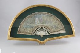 Two 19th century French fans, each painted with elegant figures (one glazed), a tortoiseshell and