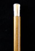 An Edwardian Brigg 12.5ct gold mounted malacca walking cane, inscribed for RM Cowie, 2nd Lifeguards,
