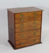 A small Victorian campaign chest, of six graduated drawers with brass handles, W.1ft 9in. H.2ft.