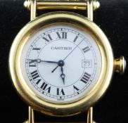 A Cartier 18ct gold quartz wrist watch, with white circular Roman dial and date aperture, case