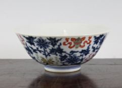 A Chinese famille rose and underglaze blue bowl, Xianfeng mark but later, decorated with the eight