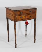 A Regency mahogany work table, with hinged top and dummy drawers, on ring turned legs, W.1ft 8in.