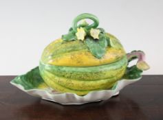 A fine Chelsea melon tureen, cover and cabbage leaf stand, c.1755, the tureen painted in yellow