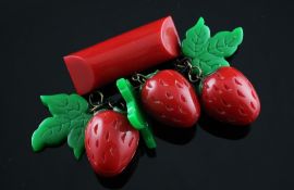 A 1930`s stained two colour bakelite "strawberry" brooch, drop 3in.