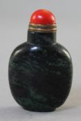 A Chinese ruby zoisite snuff bottle, 5.9cm., stopper