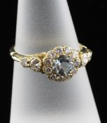 A Victorian style 18ct gold aquamarine and diamond set cluster dress ring, size N.