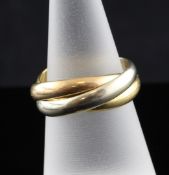A Must de Cartier 18ct three colour gold "Russian" wedding ring, numbered A8401C, 9.2 grams, size