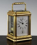 An early 20th century French gilt brass hour repeating alarum carriage clock, retailed by