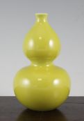 A Chinese yellow glazed double gourd vase, Yongzheng mark but later, 7in.