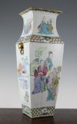 A Chinese famille rose square baluster vase, late 19th century, painted with figures undertaking