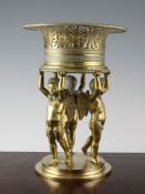 A Regency ormolu centrepiece, with pierced basket supported by three cherubs, 12in.