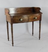 A 19th century mahogany serving table, with gallery back and two bowfront frieze drawers, W.3ft