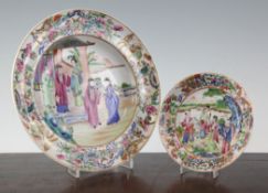 A Chinese Canton decorated famille rose soup dish and similar saucer, Daoguang period, each