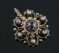 A 19th century gold, sapphire and diamond pendant, of foliate form, set with old mine cut stones,