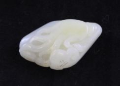 A Chinese white jade carving of a finger citron, lingzhi and a gourd, the stone with a pale russet