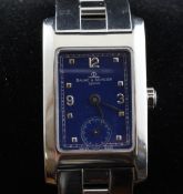 A lady`s stainless steel Baume & Mercier quartz wrist watch, with rectangular blue dial, baton and