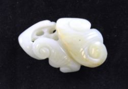 A Chinese white and russet jade carving of lingzhi fungus, 18th / 19th century, approx. 1.8in.