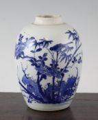 A Chinese blue and white ovoid jar, Transitional period, painted with birds amid peonies, bamboo and