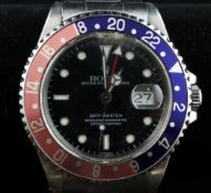 A gentleman`s late 1990`s stainless steel Rolex Oyster Perpetual Date GMT-Master wrist watch, with