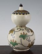 A Japanese Kutani porcelain double vase, Meiji period, painted with phoenixes, paulownia and mon,