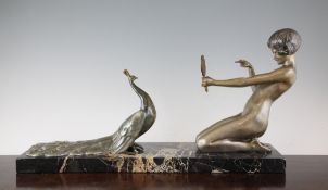 Désiré Grisard. An Art Deco bronze and marble group of a nude maiden and a peacock, signed on marble