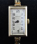 A lady`s early 1920`s 9ct gold Rolex Unicorn wrist watch, with rectangular Arabic dial, on