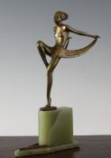 A Lorenzl Art Deco bronze figure of a dancing girl, on a pointed green onyx base, signed, 11in.