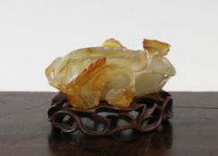 A Chinese agate brush washer, late 19th / early 20th century, carved as a curled up leaf with