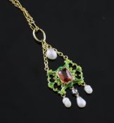 A late 19th/early 20th century gold, diamond, baroque pearl, hessonite garnet and enamel drop