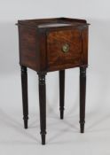 A Regency mahogany bedside cupboard, with single door, on reeded supports, W.1ft 4in.