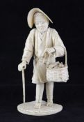 A Japanese ivory and bone sectional figure of a farmer, early 20th century, the figure standing