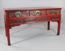 A 19th century painted Chinese side table, with three frieze drawers, on square section supports,
