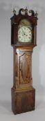 An early 19th century ebony strung mahogany eight day longcase clock, the 13 inch arched dial