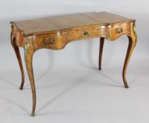 A 19th century French serpentine shaped parquetry kingwood poudreuse, with gilt mounts and scrolling