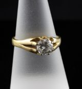 An 18ct gold claw set solitaire diamond ring, the stone approximately 0.70ct, size Q.