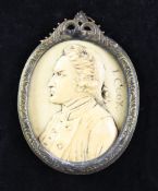 A late 19th century ivory plaque, carved in relief with a portrait of a gentleman, inscribed J.Cook,