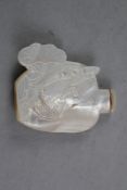 A Chinese horn egg plant shaped snuff bottle, 5.5cm., a Chinese mother of pearl snuff bottle