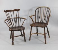A 19th century yew wood Windsor armchair, with elm seat and crinoline stretcher, together with a