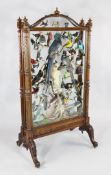 A fine Victorian carved walnut taxidermy firescreen of South American interest, with a display of