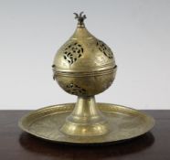 An Ottoman spherical incense burner on stand, engraved with scrolling flowers, 6.25in.