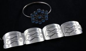 An early 1970`s Astrid Fog for Georg Jensen sterling silver and blue enamelled bangle, design number