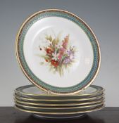 A set of six Royal Worcester dessert plates, date code for 1874, each painted to the centre with a