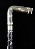 A bone inlaid and ivory ebony walking cane, with horn handle, probably Indian, 37in.