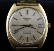 A gentleman`s gold plated and stainless steel Longines Conquest Automatic wrist watch, with baton