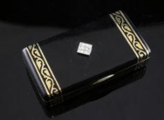 A late 1920`s Cartier silver gilt, black enamel and diamond pill box, of rectangular form, with