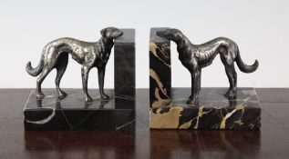 A pair of French Art Deco silvered bronze and marble bookends, modelled as saluki`s, 4in.