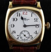 A gentleman`s 1920`s 18ct gold Waltham manual wind wrist watch, with Arabic dial and subsidiary