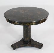 An early Victorian black and gold chinoiserie circular centre table, on platform base, W.2ft 7.5in.